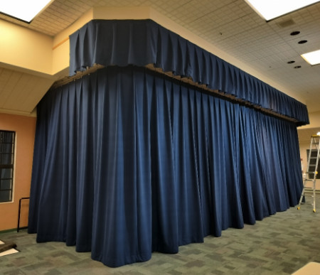 District-Wide Stage Drapery Fire-Code Compliance + Preventative Maintenance Program for Schools